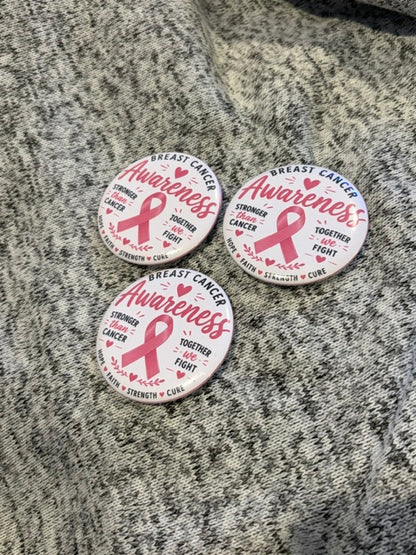 Custom DC Print Haus button pins featuring colorful, round metal designs with various graphic artwork on a white background.