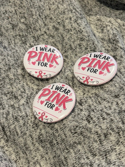 Custom DC Print Haus button pins featuring colorful, round designs with superhero-themed artwork on a white background.