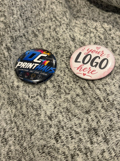 Custom button pins by DC Print Haus featuring vibrant designs and durable metal backing, ideal for accessories or promotional use.